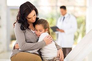 Mother and child at doctor's office