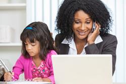 Parent on computer with child